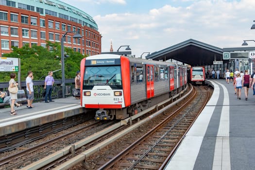 Hamburg, Germany - July 25, 2012: people enter the train at Baumwall U-Bahn Station in Hamburg. Hamburg U-Bahn (Metro Rapid Transit System) was opened in 1912 and comprises four lines with a length of 105 km in 2012.