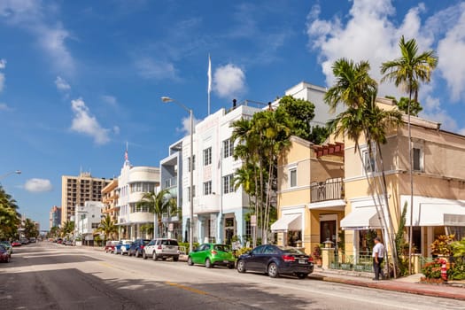 Mimi Beach, USA - August 5, 2013: street with old buildings in the art deco district in Miami, USA.