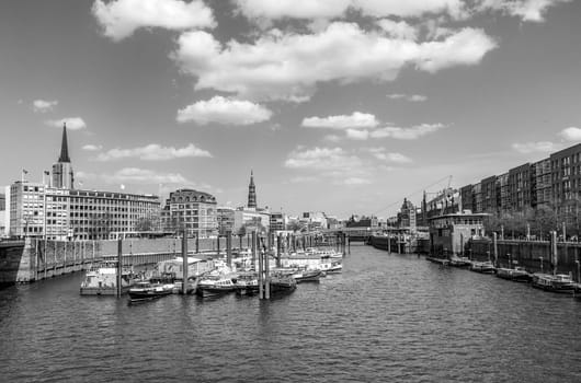 Hamburg, Germany - April 18, 2013: Boats in a canal in the Baumwall area in Hamburg, Germany.