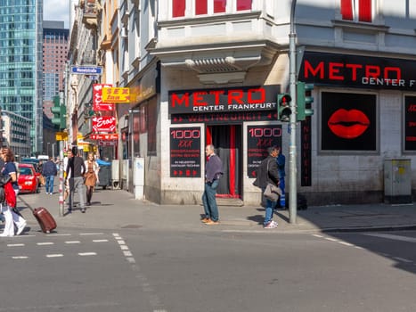 Frankfurt, Germany - May 17, 2014: the sex shops and bars are at the Moselstrasse in train station area in Frankfurt, Germany.