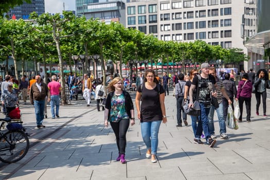 Frankfurt, Germany - June 3, 2014: people promenade at the Zeil in Frankfurt, the most famous shopping stree3t and pedestrian zone in Germany.