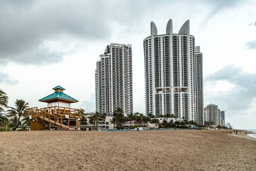 Sunny Isles Beach, USA - August 17, 2014: view to skyscraper at the beach of Sunny Island near Miami, USA.
