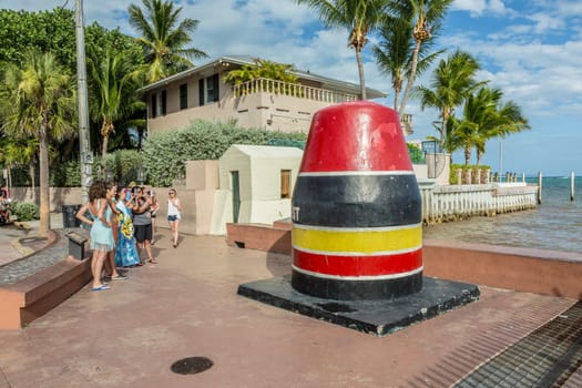 Key West, USA - August 26, 2014: people visit Southernmost Point marker, Key West, Florida, USA.