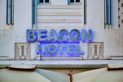 Miami, USA - August 30, 2014: view to neon signage of famous Beacon hotel at ocean drive, Miami, USA.