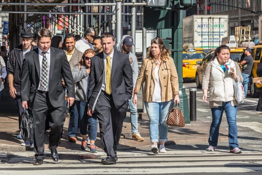New York, USA - October 21, 2015: street view with people near Madison Square Garden, Manhattan, New York City, USA. New York is the most populous city in the United States.