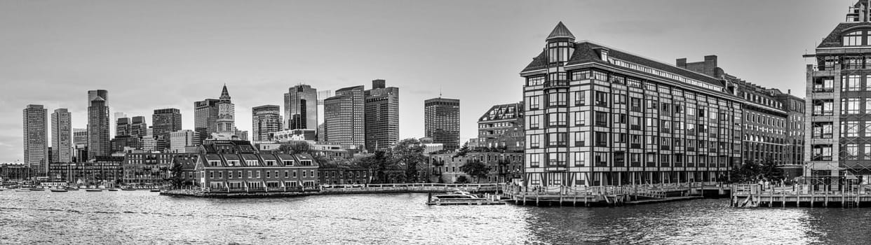Boston, USA - September 29, 2017: view to  skyline of Boston with old and modern skyscraper and river with boats.