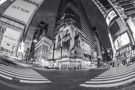 NEW YORK, USA  OCT 5, 2017:  neon advertising of News, brands and theaters at times square in early morning. Times square is a symbol for New York life and amusement.