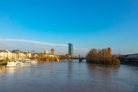Frankfurt, Germany - January 9, 2018: view to skyline of Frankfurt with new building of European central Bank with river Main.