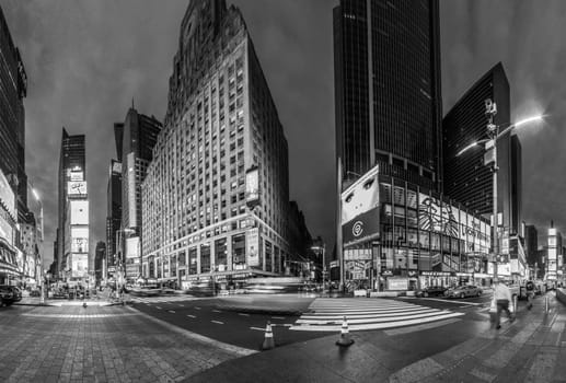 NEW YORK, USA  OCT 5, 2017:  neon advertising of News, brands and theaters at times square in late afternoon. Times square is a symbol for New York life and amusement.