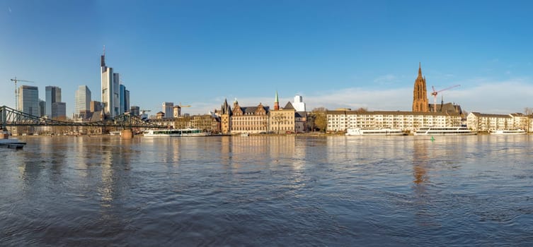 Frankfurt, Germany - January 9, 2018: panoramic view of Frankfurt am Main with view to modern skyscraper and the historic dome at river Main.