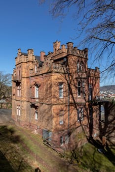 Miltenberg, Germany - April 6, 2018: old brickstone building overlooking the town of Miltenberg.