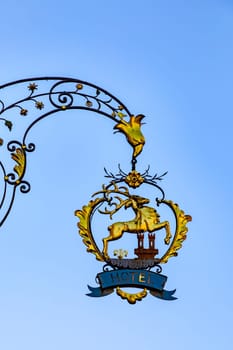 Rothenburg ob der Tauber, Germany - April 6, 2018: outdoor signage for a hotel in the medieval town of Rothenburg, Germany.