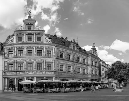 Erfurt, Germany - July 29, 2018: facade at house  ZUM BREITEN HERD  engl: House of wide oven at Fischmarkt, Erfurt, Thuringia, Germany, Europe