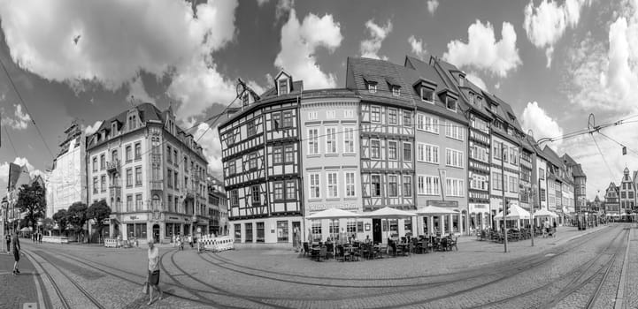 Erfurt, Germany - July 29, 2018: people at the central square in front of the cathedral at the city of Erfurt, Germany. Erfurt is the Capital of Thuringia and the city was first mentioned in 742.