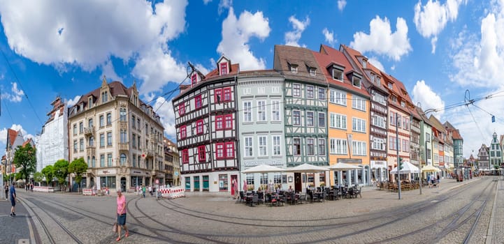 Erfurt, Germany - July 29, 2018: people at the central square in front of the cathedral at the city of Erfurt, Germany. Erfurt is the Capital of Thuringia and the city was first mentioned in 742.
