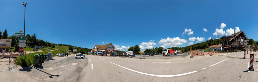 Col de Schlucht, France - June 20, 2018: at the col de Schlucht on a summer day with panoramic view of parking lot and restaurants.