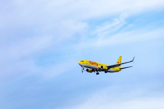 Frankfurt, Germany - April 4, 2019: aircraft of TUI Fly in landing approach at Frankfurt international airport.
