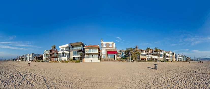 Manhattan Beach, USA - March 4, 2019: scenic beach houses at the promenade of Manhattan beach, USA near Los Angeles.