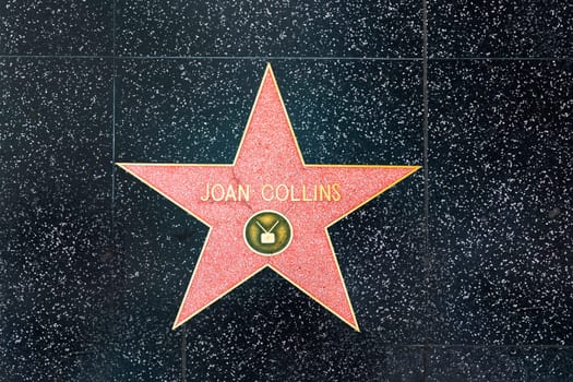 Los Angelesd, USA - March 5, 2019: closeup of Star on the Hollywood Walk of Fame for Joan Collins.