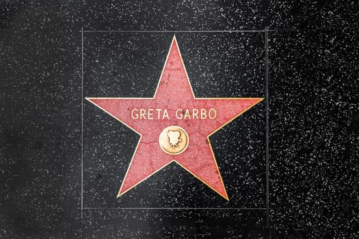 Los Angeles, USA - March 5, 2019: closeup of Star on the Hollywood Walk of Fame for Greta Garbo.