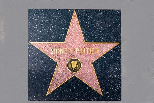 Los Angeles, USA - March 5, 2019:  closeup of Star on the Hollywood Walk of Fame for Sidney Poitier.