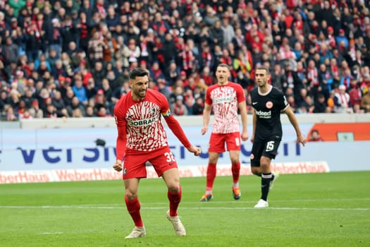 Vincenzo Grifo (SC Freiburg) celebrates his penalty goal to level the score at 2:2 in the match of the 1. FBL: 23-24: 22. Sptg. SC Freiburg - Eintracht Frankfurt  DFL REGULATIONS PROHIBIT ANY USE OF PHOTOGRAPHS AS IMAGE SEQUENCES AND/OR QUASI-VIDEONann  Photo: Joachim Hahne/johapress