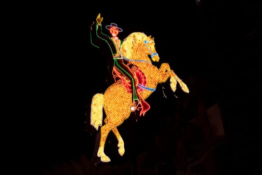 Las Vegas, USA  - March 9, 2019: cowboy neon signs at Fremont East District of Las Vegas