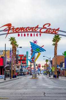Las Vegas, USA - March 10, 2019: Fremont East district entrance sign with neon sculptures in early morning light in old part of Las Vegas, USA.