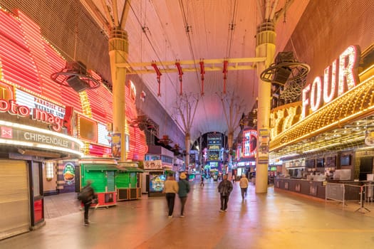 Las Vegas, USA - March 11, 2019: casinos in historic Fremont street experience are open for gamblers by night in Las Vegas, USA.