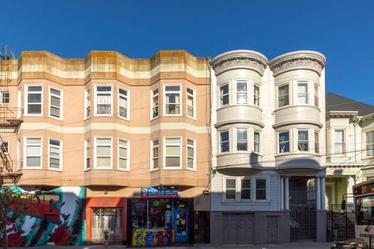 San Francisco, USA - March 13, 2019: typical old houses and street scene in Cole street downtown San Francisco.