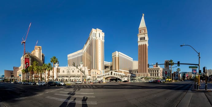 Las Vegas, USA - May 24, 2022: view to hotels and casinos at the Strip in daytime with neon advertising.