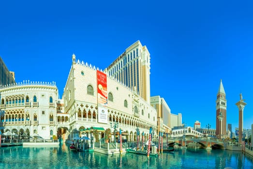 Las Vegas, USA - May 24, 2022: view to the Venetian resort and casino with replica of Grand canal with Rialto bridge and gondolas, replica of Venice in Italy.