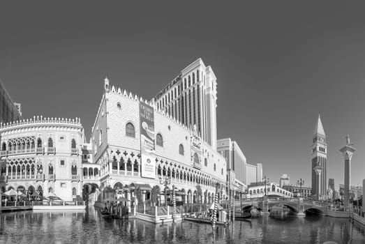 Las Vegas, USA - May 24, 2022: view to the Venetian resort and casino with replica of Grand canal with Rialto bridge and gondolas, replica of Venice in Italy.