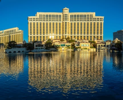 Las Vegas, USA - May 25, 2022:view to Bellagio hotel with reflection in the lake in early morning light, Las Vegas, USA.