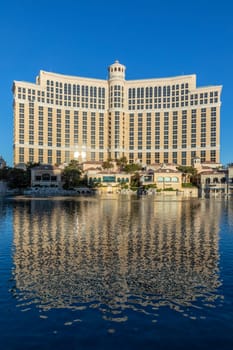 Las Vegas, USA - May 25, 2022: view to Bellagio hotel with reflection in the lake in early morning light, Las Vegas, USA.