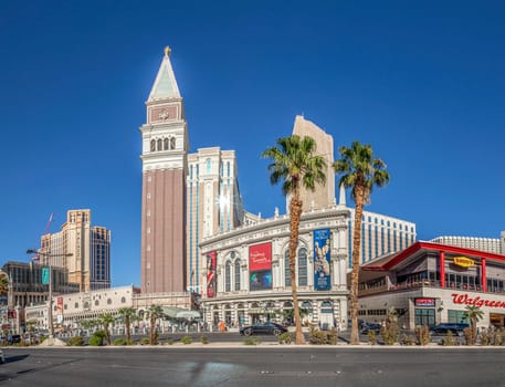 Las Vegas, USA - May 24, 2022: view to hotels and casinos at the Strip in daytime with neon advertising.
