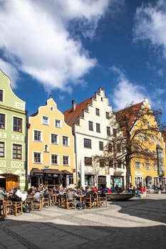 Ingolstadt, Germany - April 6, 2019: view to old town of Ingolstadt with half timbered historic houses downtown and beautiful renovated facades.