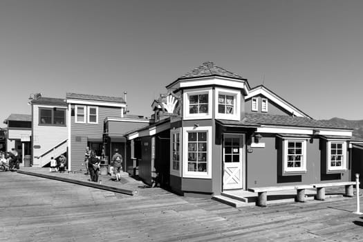 Santa Barbara, USA - March 16, 2019: historic  house at Santa  Barbara pier under blue sky.