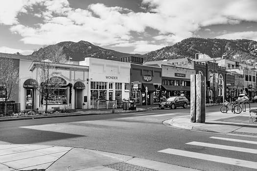 Boulder, USA - December 25, 2019: View of the Pearl Street Mall, a landmark pedestrian area in downtown Boulder, Colorado, in the Rocky Mountains.