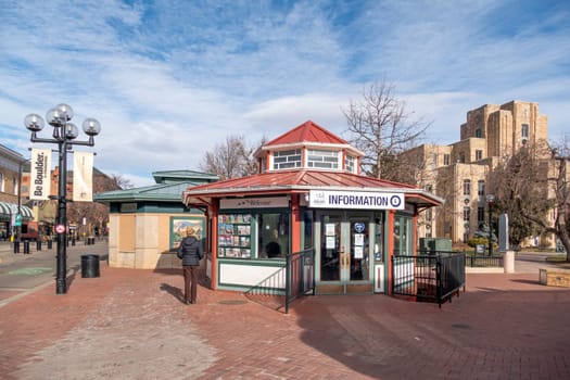 Boulder, USA - December 25, 2019: View of the Pearl Street Mall, a landmark pedestrian area in downtown Boulder, Colorado, in the Rocky Mountains.