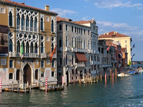 Venice, Italy - July 1, 2021: view to canale grande from bridge Academia in afternoon sun in Venice, Italy.