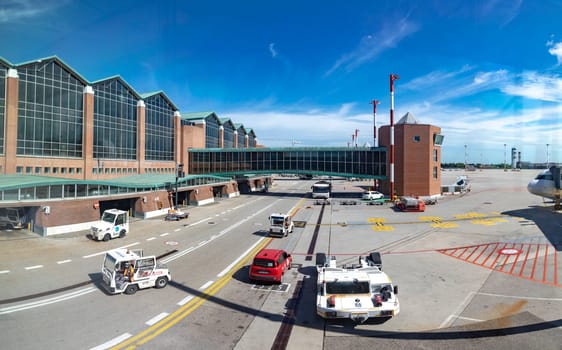 venice, Italy - July 1, 2021: apron at the  Venice Airport Marco Polo with modern departure hall.