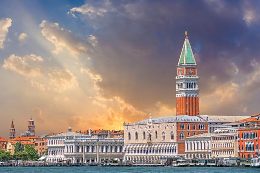 Venice, Italy - July 1, 2021: view to skyline of Venice with campanile and the doges palace under dramatic sky