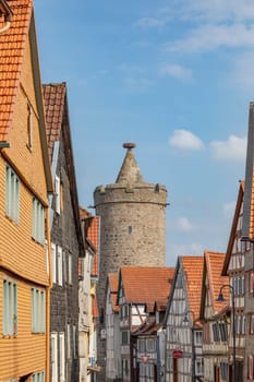 Alsfeld, Germany - June 25, 2021: famous town hall and half timbered historic houses at central square in Alsfeld, germany.