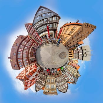 Alsfeld, Germany - June 25, 2021: tiny world format at famous town hall and half timbered historic houses at central square in Alsfeld, germany.