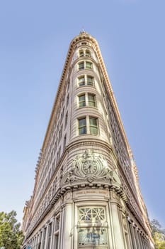 Oakland, USA - May 19, 2022: old historic flatiron building called Lionel Wilson in Oakland.