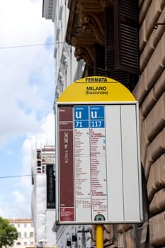 Rome, Italy - August 5, 2021: timetable of public bus company ATAC in Rome, Italy at station Milano.