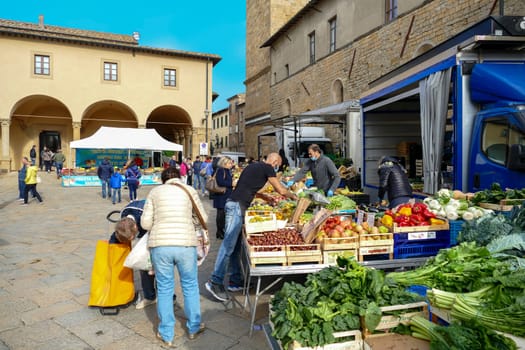 Siena, Italy - October 23, 2021: farmers market in Sienna with fresh vegetables and local food.