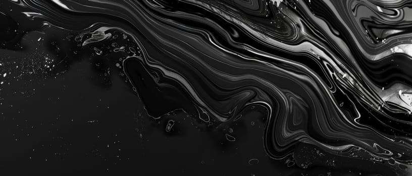 A captivating swirl of black and white marble creates an artistic flow in this image. The golden accents provide a luxurious contrast against the fluid marble patterns