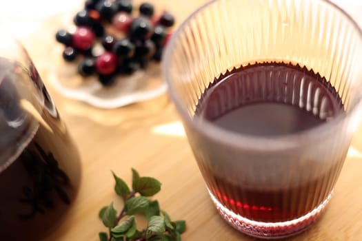 Grape juice poured into a stylish glass